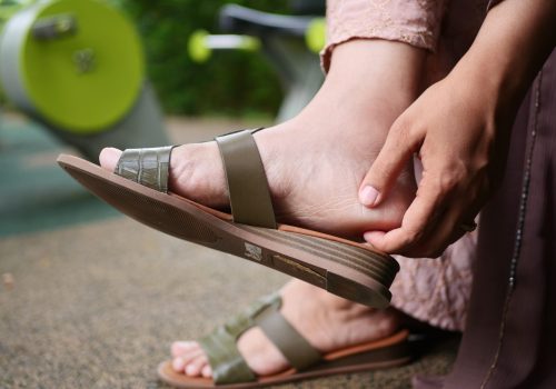 Close up on women feet and hand massage on injury spot